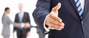 Man holding out his arm for a handshake